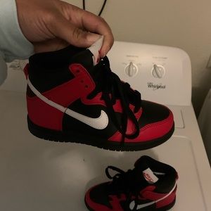 Brand new High Top Jordan 1s black & red size 12 never worn come with box.